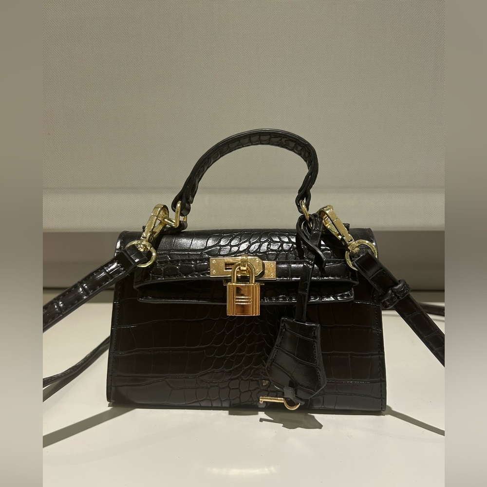 Princess Polly Peta and Jain Crocodile print black crossbody with gold hardware